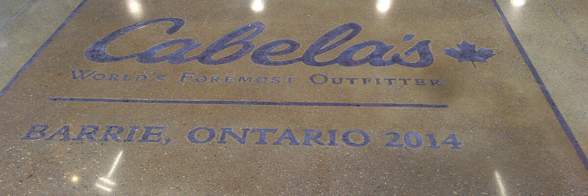 Cabela's logo on polished concrete floor.